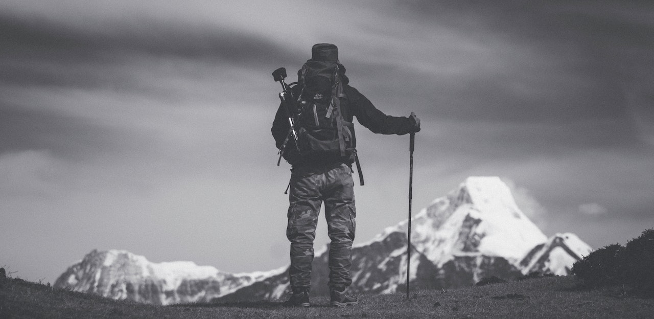 hiker looking at mountain